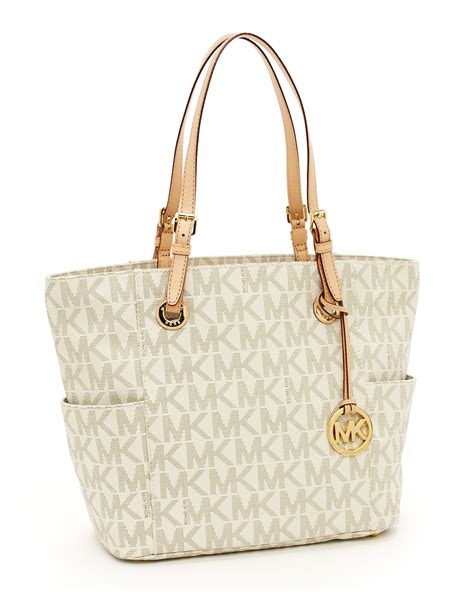 michael michael kors jet set signature tote bag signature vanilla|michael kors airplane bag.